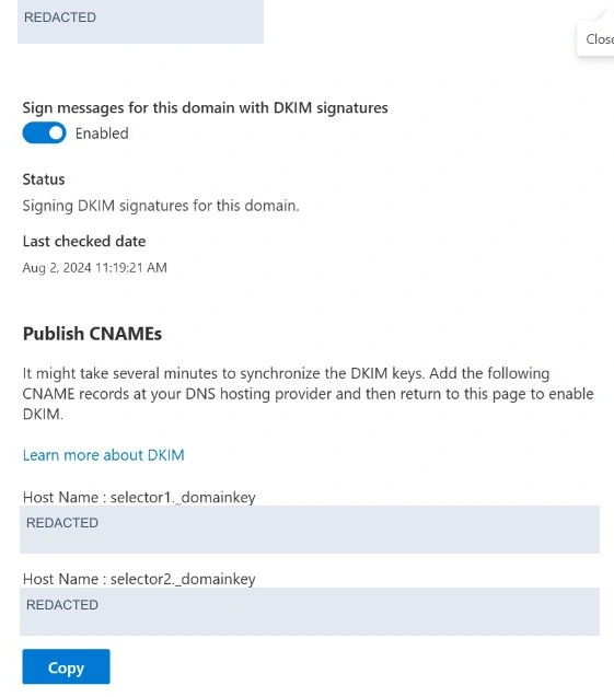 DKIM domain details with signing enabled and two selector CNAME host names; identifying target values are redacted.